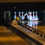 bowling balls hitting pins